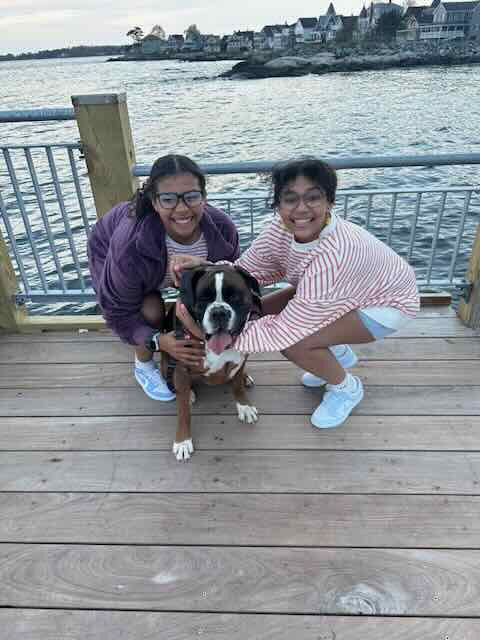 Madi and Say posing with Leo
