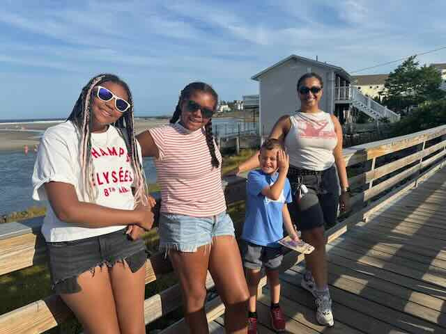 Madi and Say on a sunny boardwalk