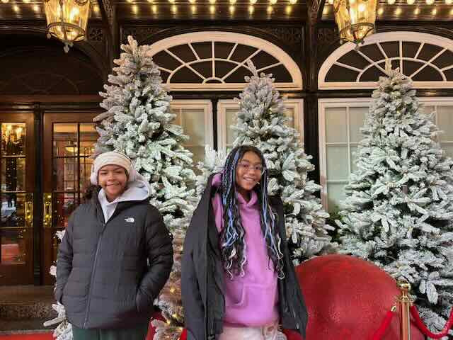 Madi and Say by holiday decorations